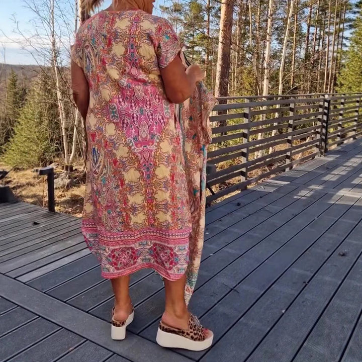 Women's airy V-neck dress in paisley print with side pockets and matching pareo Mune Fashion