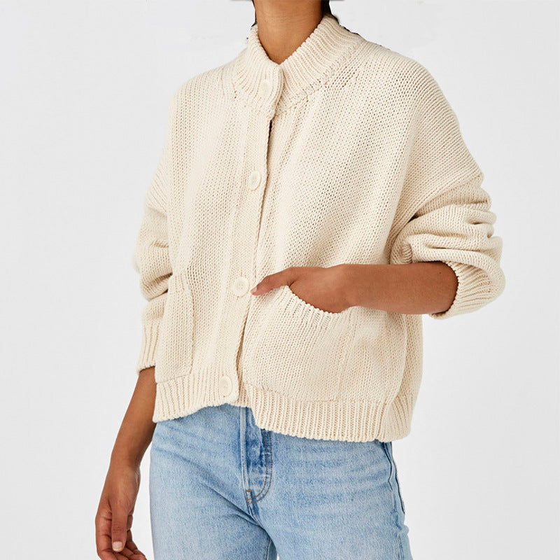 Women's Short Boxy Cardigan made of chunky knit with high button placket and side pockets Mune Fashion