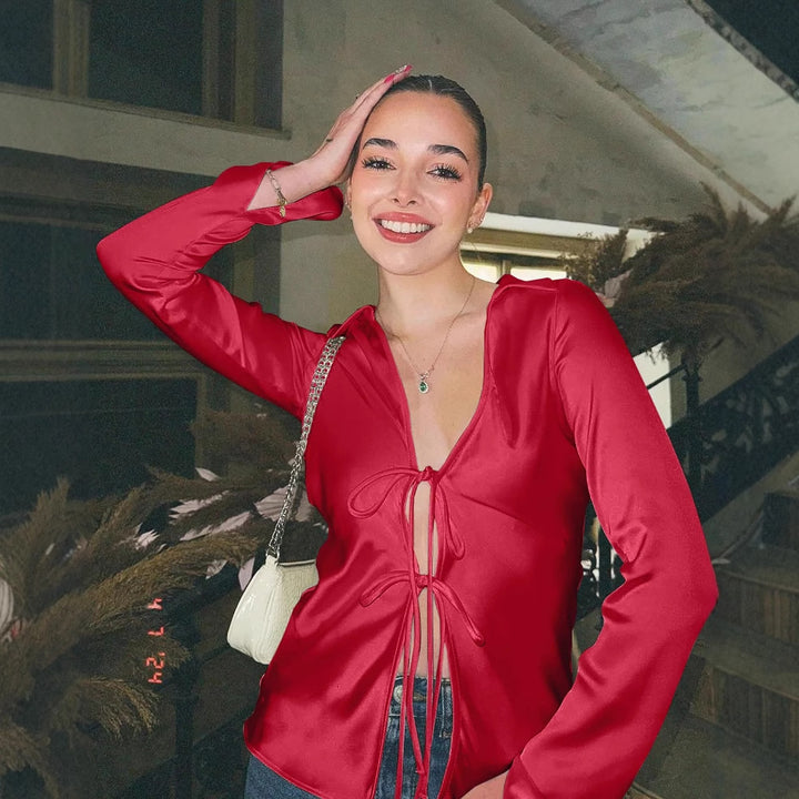 Women's blouse with deep V-neckline and tie ribbons tailored fit flared sleeves Mune Fashion