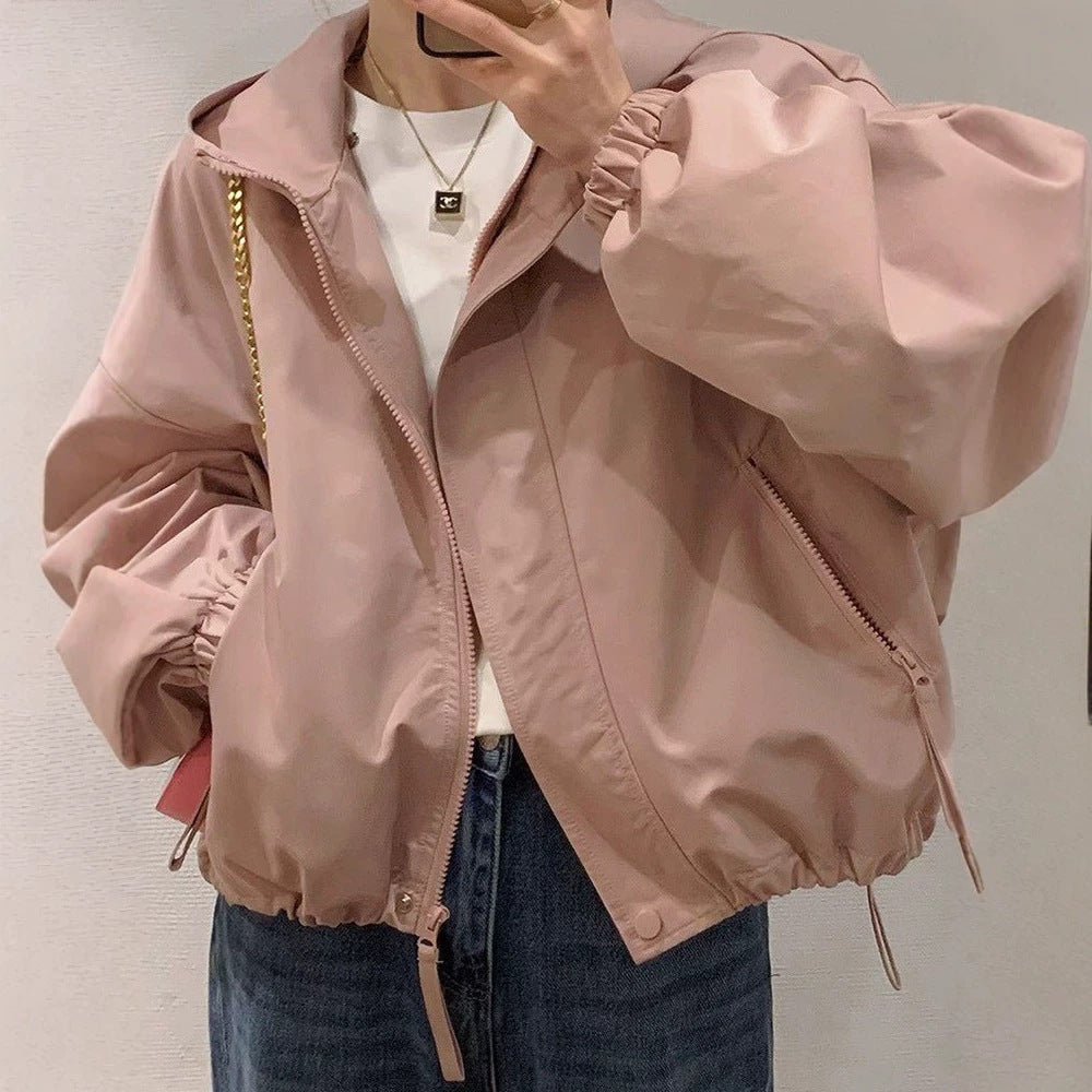 Women's oversized bomber-style hooded jacket with drawstring, elastic cuffs, and side zip pockets Mune Fashion