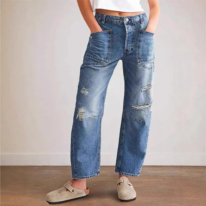Women's oversized straight-leg jeans with patch cargo pockets and used effects Mune Fashion