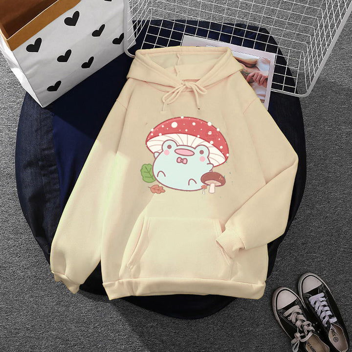 Women’s soft oversized hoodie with kawaii mushroom frog print, kangaroo pocket, and ribbed cuffs Mune Fashion