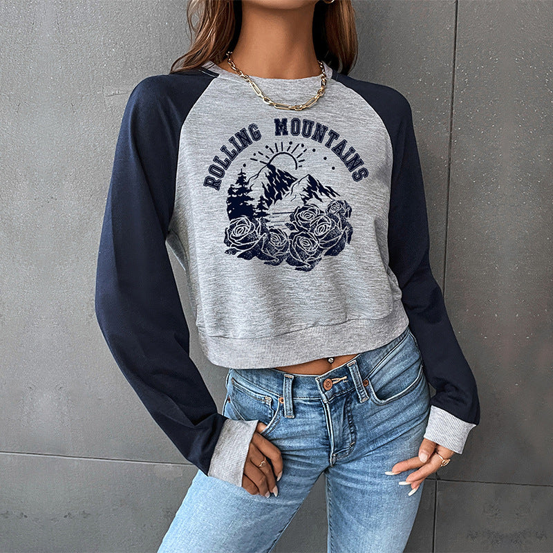 Women's Cropped Raglan Sweatshirt with Mountain Motif, Ribbed Cuffs and Loose Fit Mune Fashion
