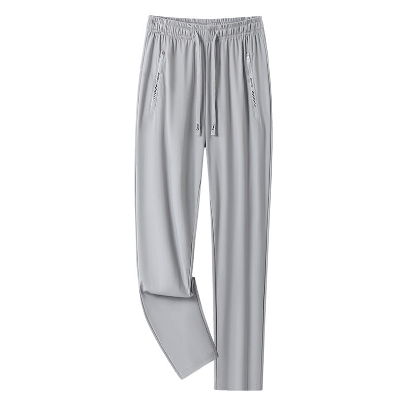 Men's sporty jogging pants with adjustable waistband and zippered pockets Mune Fashion