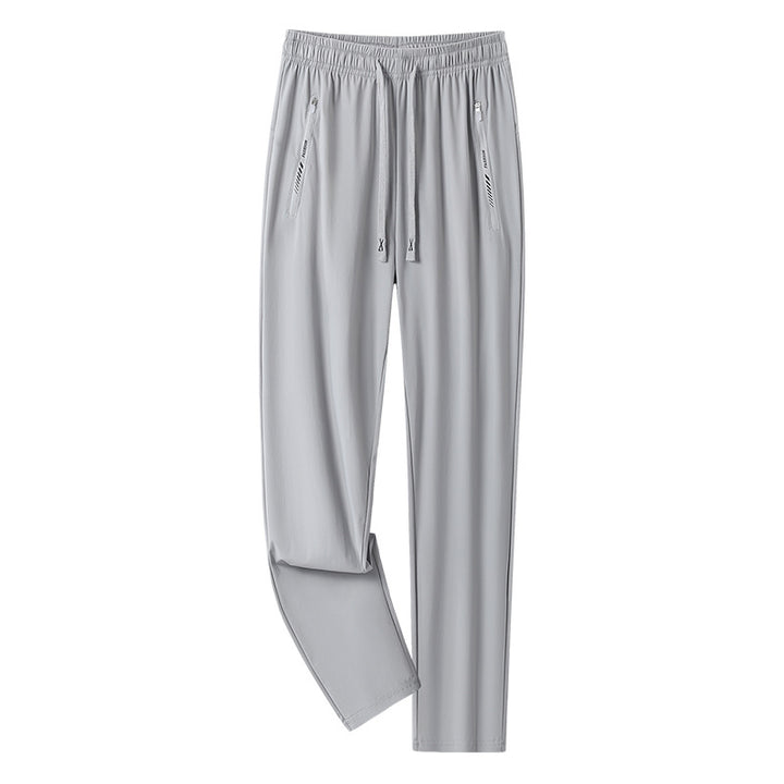 Men's sporty jogging pants with adjustable waistband and zippered pockets Mune Fashion