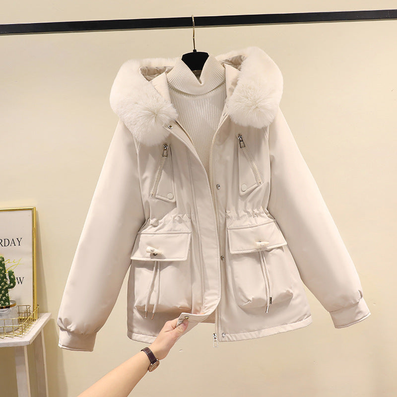 Ladies nano thermo parka with hood, voluminous faux fur collar, drawstring waist and multifunctional pockets Mune Fashion