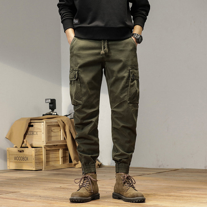 Men's robustly cut canvas cargo jogging pants with drawstring waist, knee patches, and elastic ankle cuffs Mune Fashion