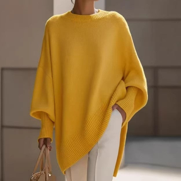Women's oversized knit poncho with asymmetrical hem and ribbed sleeves Mune Fashion