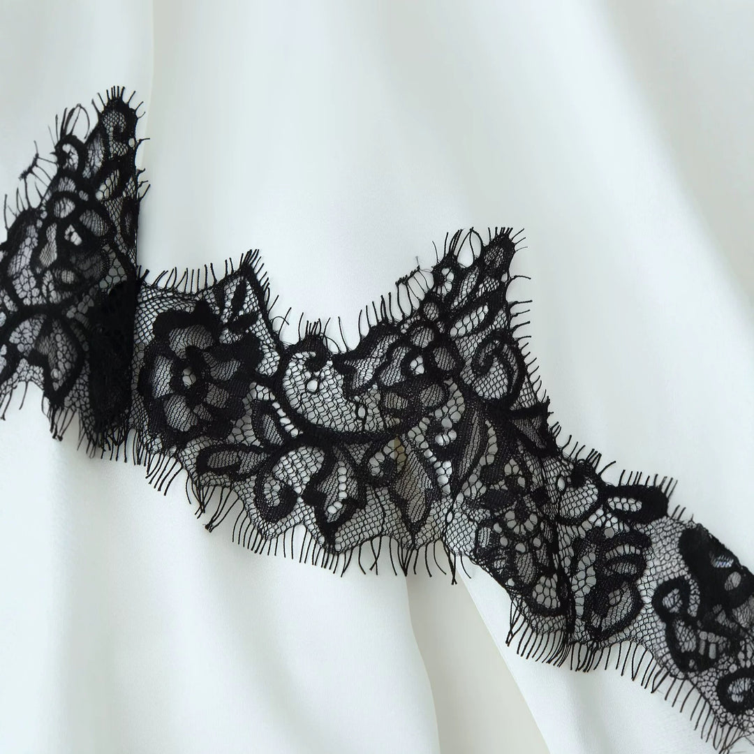 Women's elegant chiffon blouse with lace trim, wide kimono sleeves and tie belt.
