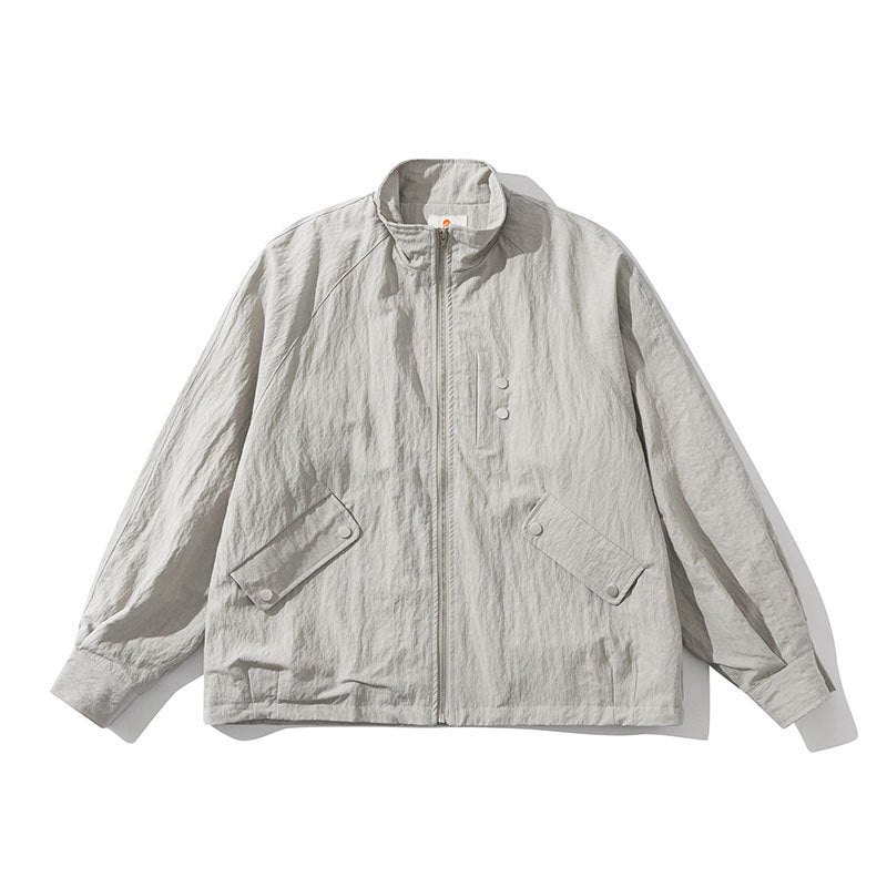 Men's Lightweight Windbreaker with Stand-Up Collar, Raglan Sleeves and Snap Button Pockets Mune Fashion
