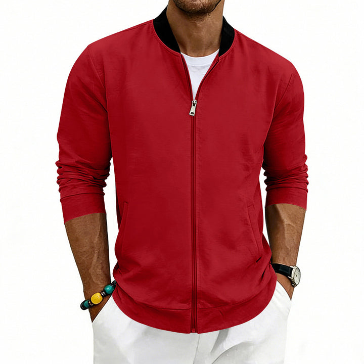 Men's lightweight bomber jacket made of jersey with stand-up collar, elastic cuffs, and concealed pockets Mune Fashion