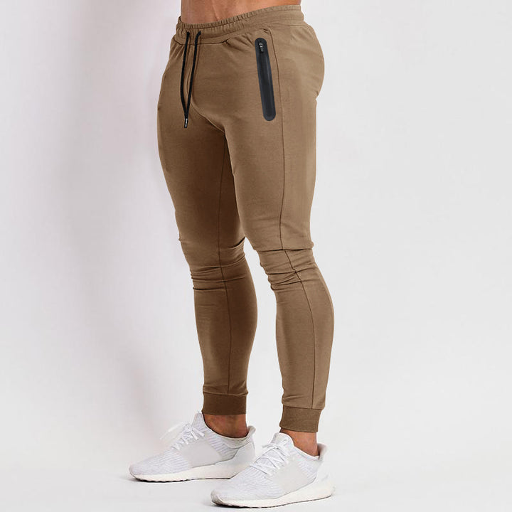 Men's slim-fit jogging pants with zip pockets and drawstring Mune Fashion