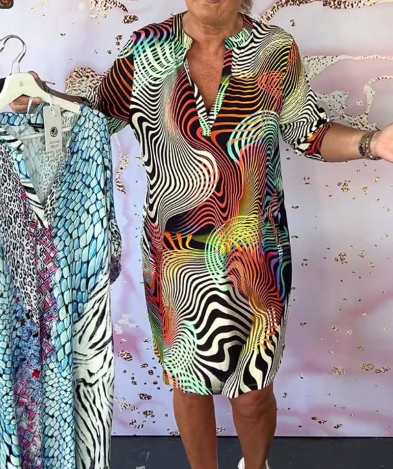 Women’s midi dress with psychedelic all-over print V-neck and casual shift fit Mune Fashion
