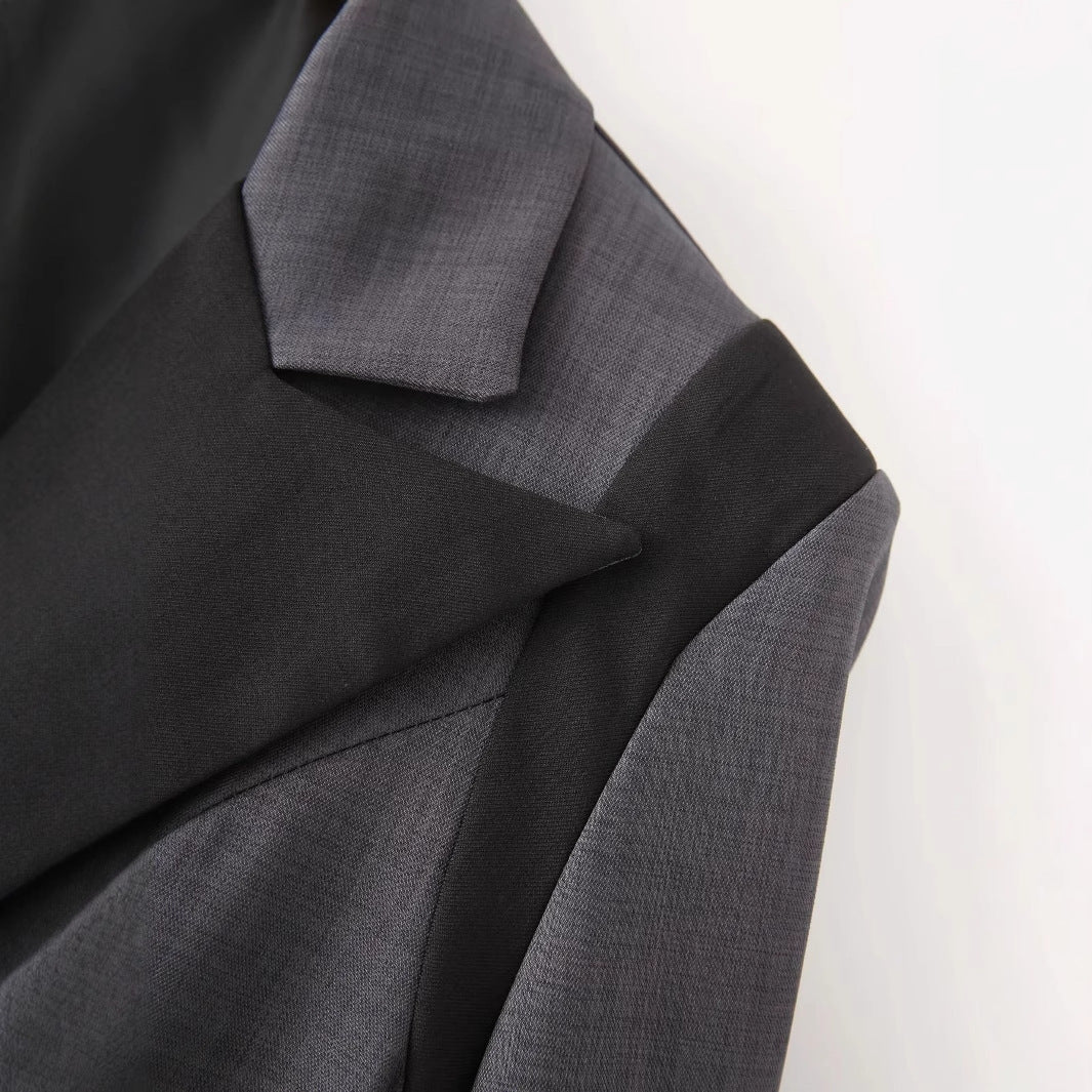 Women's oversized blazer with contrasting lapel, single-button placket, and flap pockets Mune Fashion