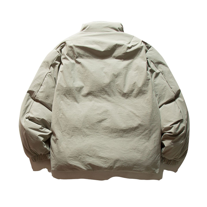 Unisex Boxy-insulated short jacket with padded filling and high stand-up collar Mune Fashion