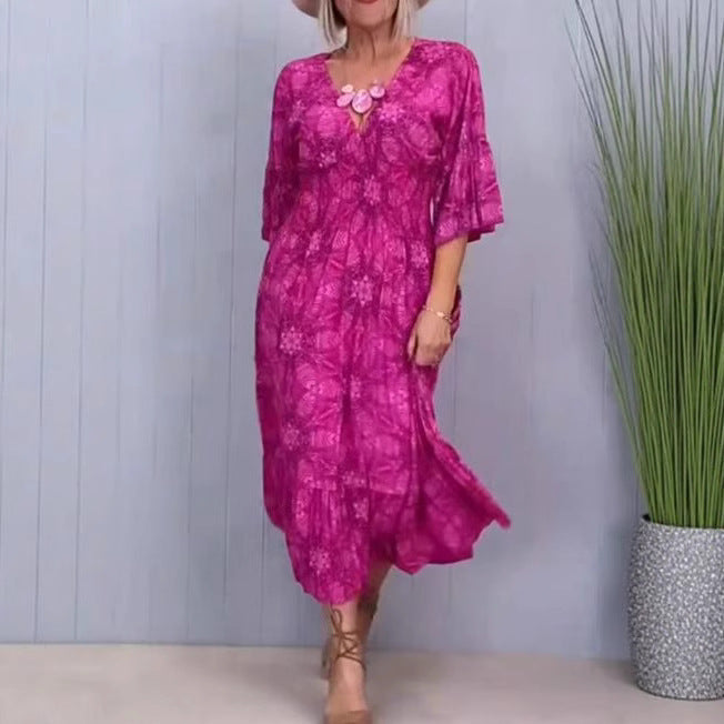 Women's airy midi dress with V-neck, tiered hem, and half-length ruffled sleeves Mune Fashion