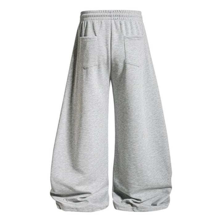 Women's loose jogging pants with elastic waistband and decorative lacing Mune Fashion