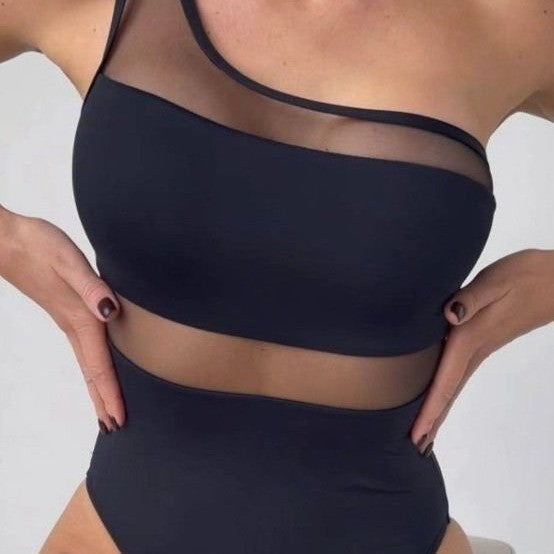 Women's one-piece swimsuit with asymmetrical cut and transparent accents Mune Fashion