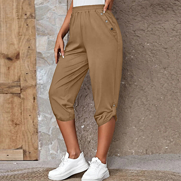 Women's casual three-quarter length pants with elastic waistband, side pockets and roll-up hem Mune Fashion