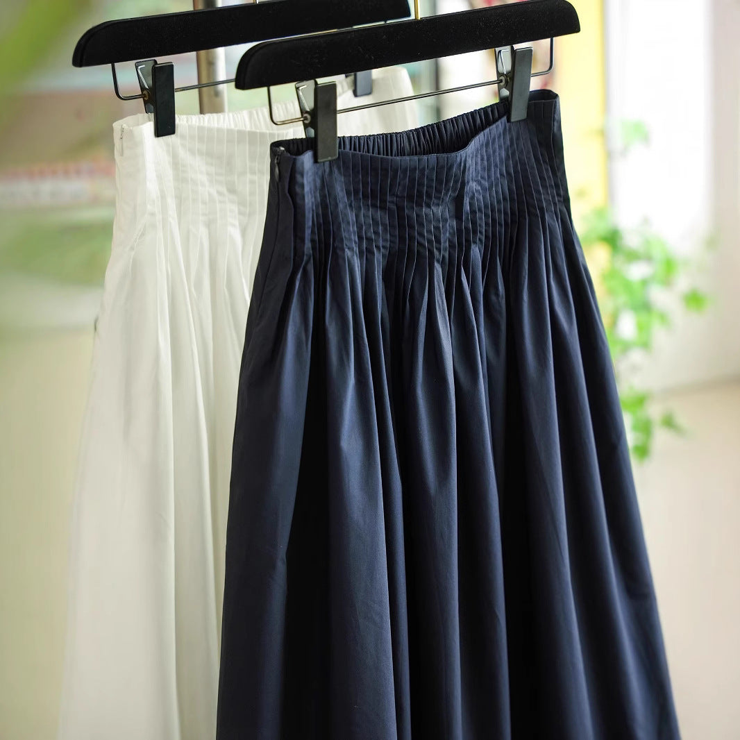 Women's midi skirt with high-rise pleated waistband and wide, gathered volume