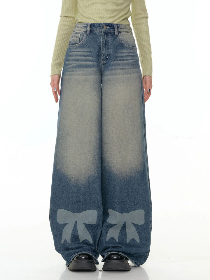 Women's high-waisted Palazzo pants made of denim with extra wide leg and bow print Mune Fashion
