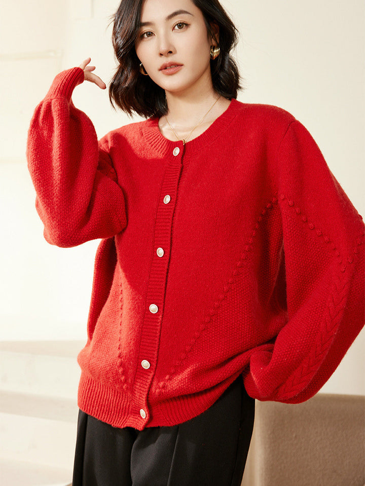 Women's knitted cardigan with textured pattern, balloon sleeves and pearly button placket Mune Fashion