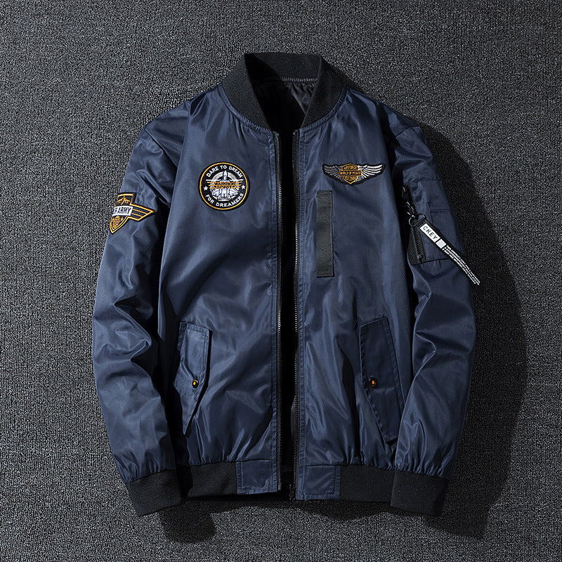 Men's bomber jacket in flight style with nylon shell, patch applications, and arm pocket Mune Fashion