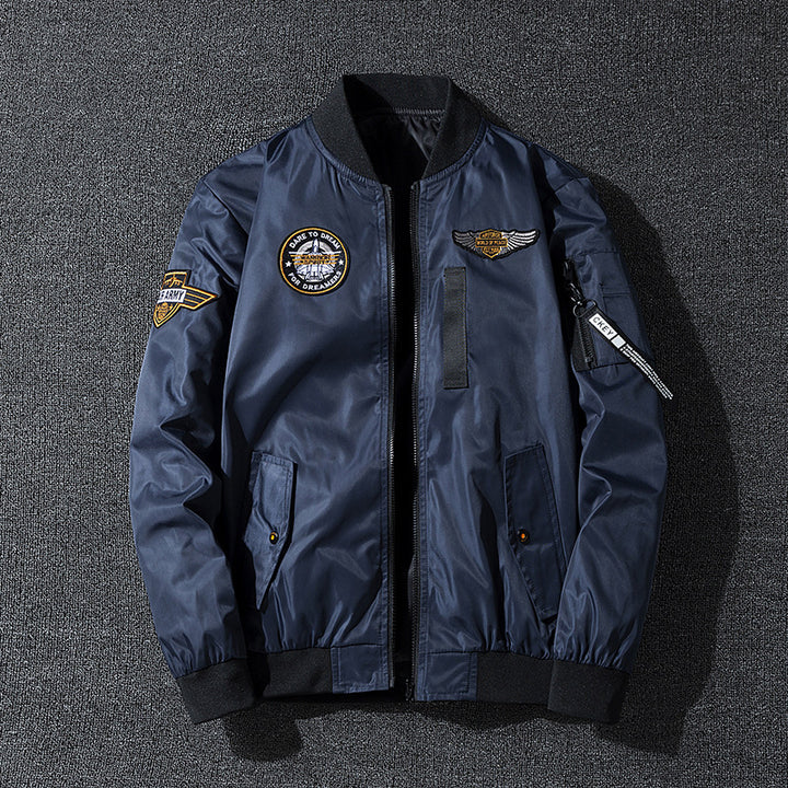 Men's bomber jacket in flight style with nylon shell, patch applications, and arm pocket Mune Fashion