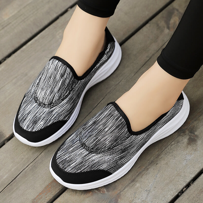 Women's elegant slip-on sneakers with elastic decorative straps, breathable knit construction and cushioned comfort sole Mune Fashion