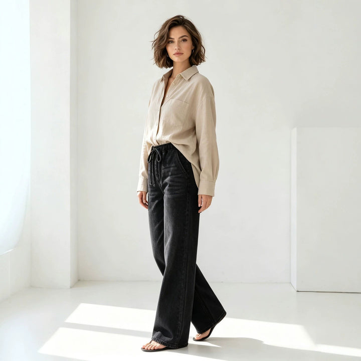 Women's Relaxed-Fit Denim Pants with elastic drawstring waistband, subtle used effect, and wide leg Mune Fashion
