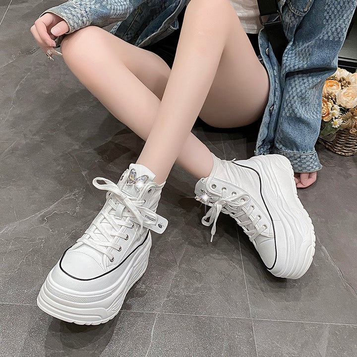 Ladies' platform sneakers with high shaft, lacing, and butterfly brooch Mune Fashion