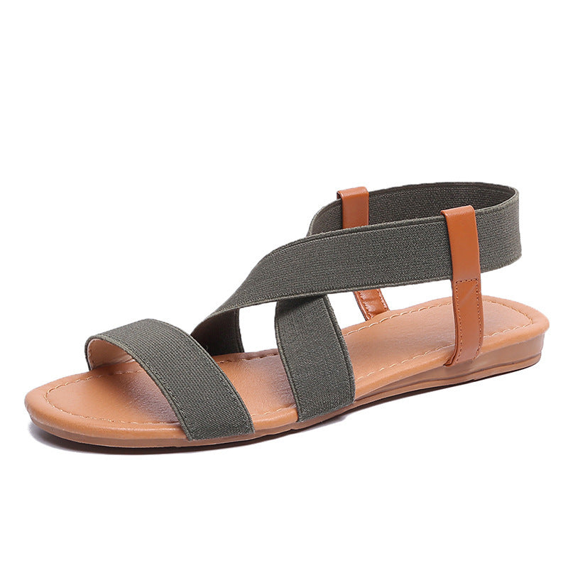Women's flat elastic strap sandals with crossed stretch bands and padded comfort footbed Mune Fashion