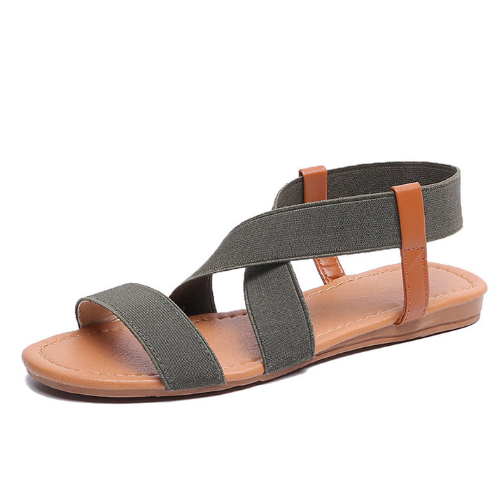Women's flat elastic strap sandals with crossed stretch bands and padded comfort footbed Mune Fashion