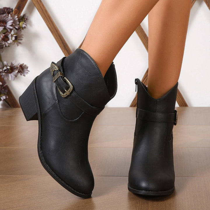 Women’s Western-inspired ankle boots with mid-height block heel, side zipper and decorative metal buckle Mune Fashion