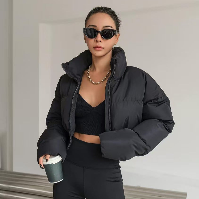 Women's cropped quilted jacket with high stand-up collar, drawstring hem and wide ribbed waistband Mune Fashion