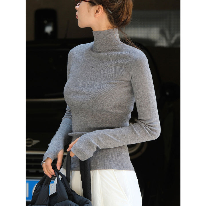 Women's body-hugging fine knit turtleneck sweater with elongated sleeves and thumb hole Mune Fashion