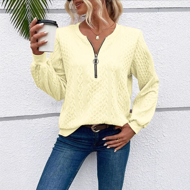Women's coarsely structured knitted pullover with cable knit pattern, half zip and balloon sleeves Mune Fashion