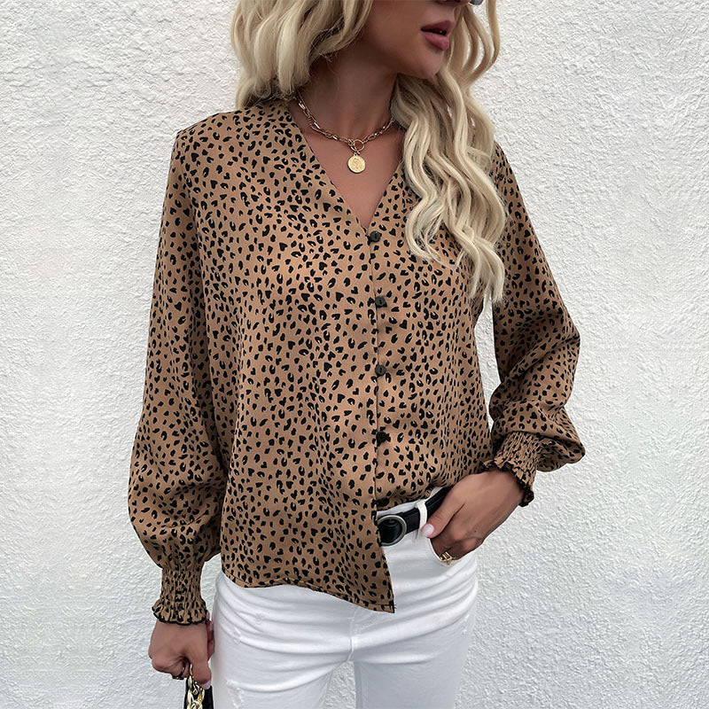 Women's lightweight blouse with V-neck, continuous button placket, and ruffled cuffs Mune Fashion