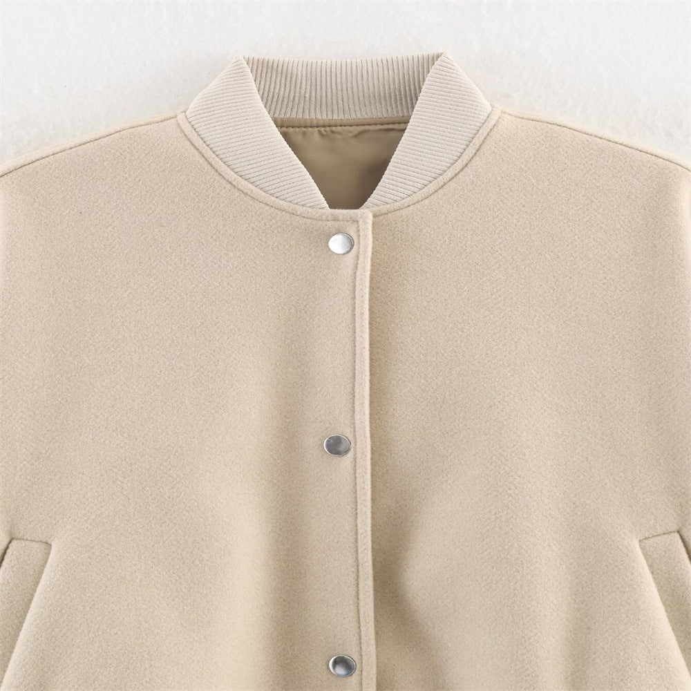 Ladies short boxy bomber jacket with ribbed collar, snap button closure, and pockets Mune Fashion