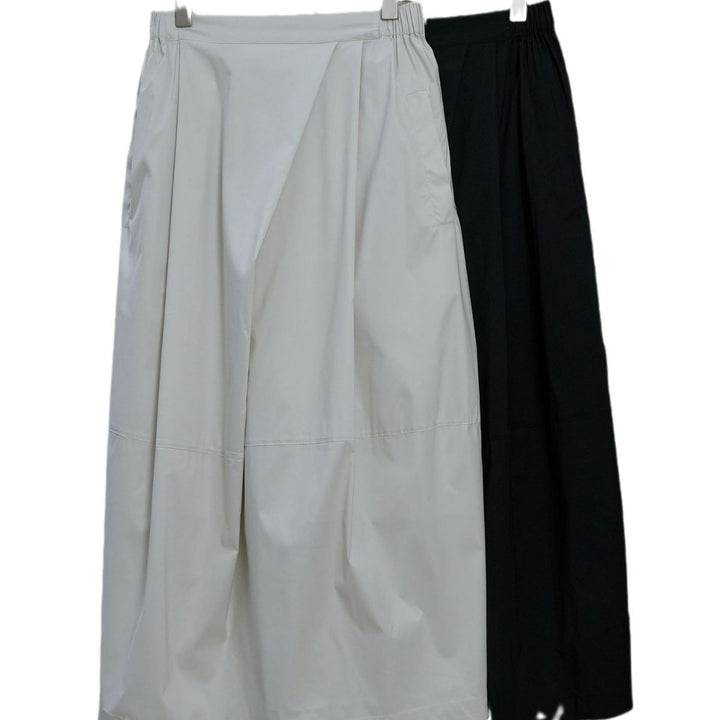 Women Longer Oversize Raincoat with concealed snap button placket and side pockets Mune Fashion