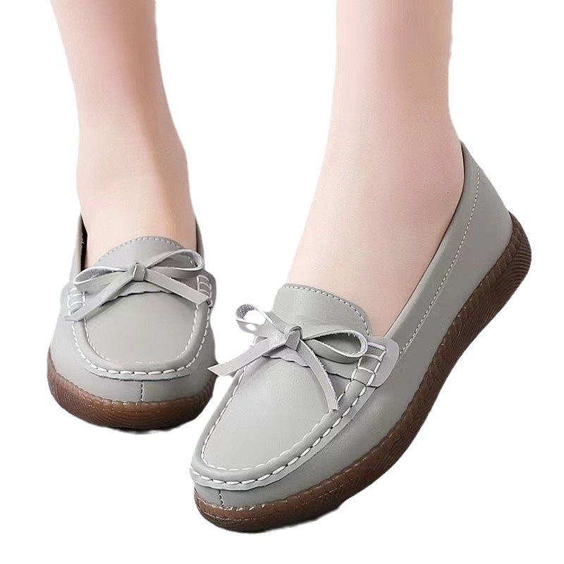 Women's comfortable leather look moccasin with bow decoration and profiled rubber sole Mune Fashion