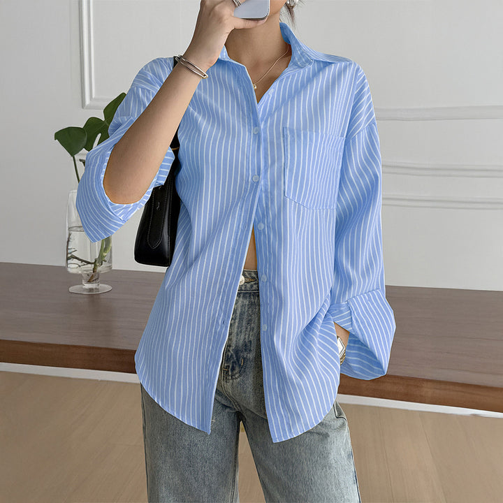 Women's oversized shirt blouse with boxy cut, breast pocket, and rounded hem Mune Fashion