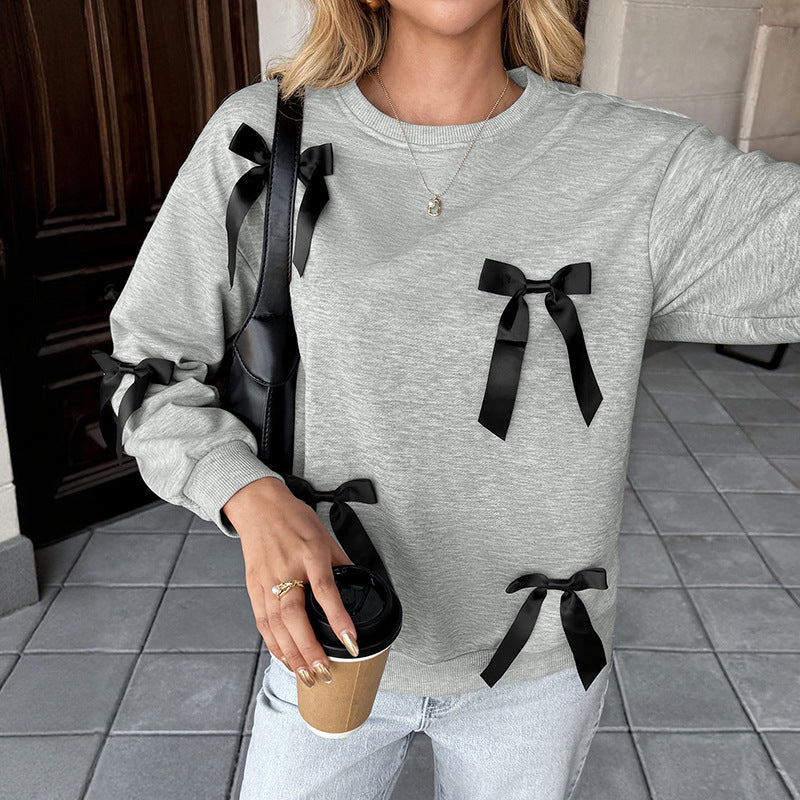 Women’s sweatshirt with satin bow trim and round neckline Mune Fashion