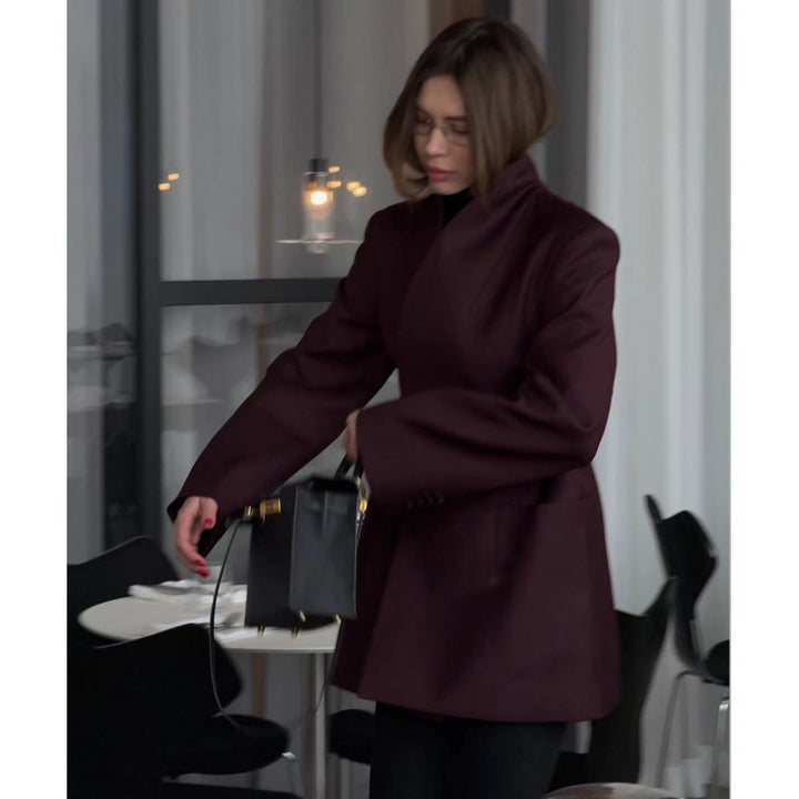 Women's tailored blazer dress coat with stand collar, distinctive shoulder shape, and patch pockets Mune Fashion