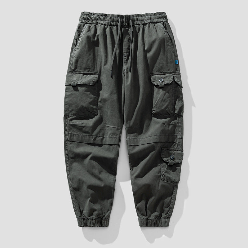 Herren Leichte Canvas-Cargohose im Joggerstil mit elastischem Bund, segmentierten Kniepaneelen und verdeckten Klappentaschen Mune Fashion