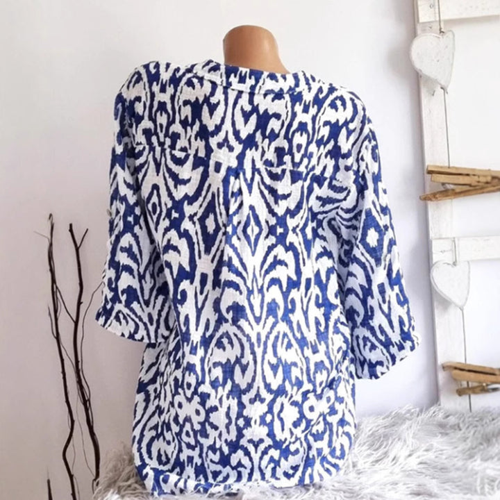 Women nan locker cut tunic blouse with Ikat pattern, V-neck and three-quarter sleeves Mune Fashion