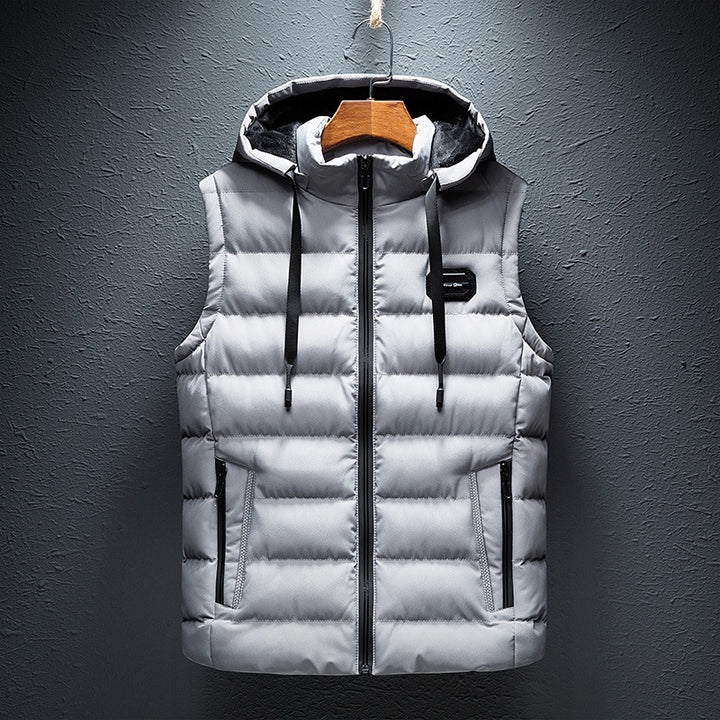 Men's quilted hooded vest with windproof microfiber cover, stand-up collar & zippered pockets Mune Fashion