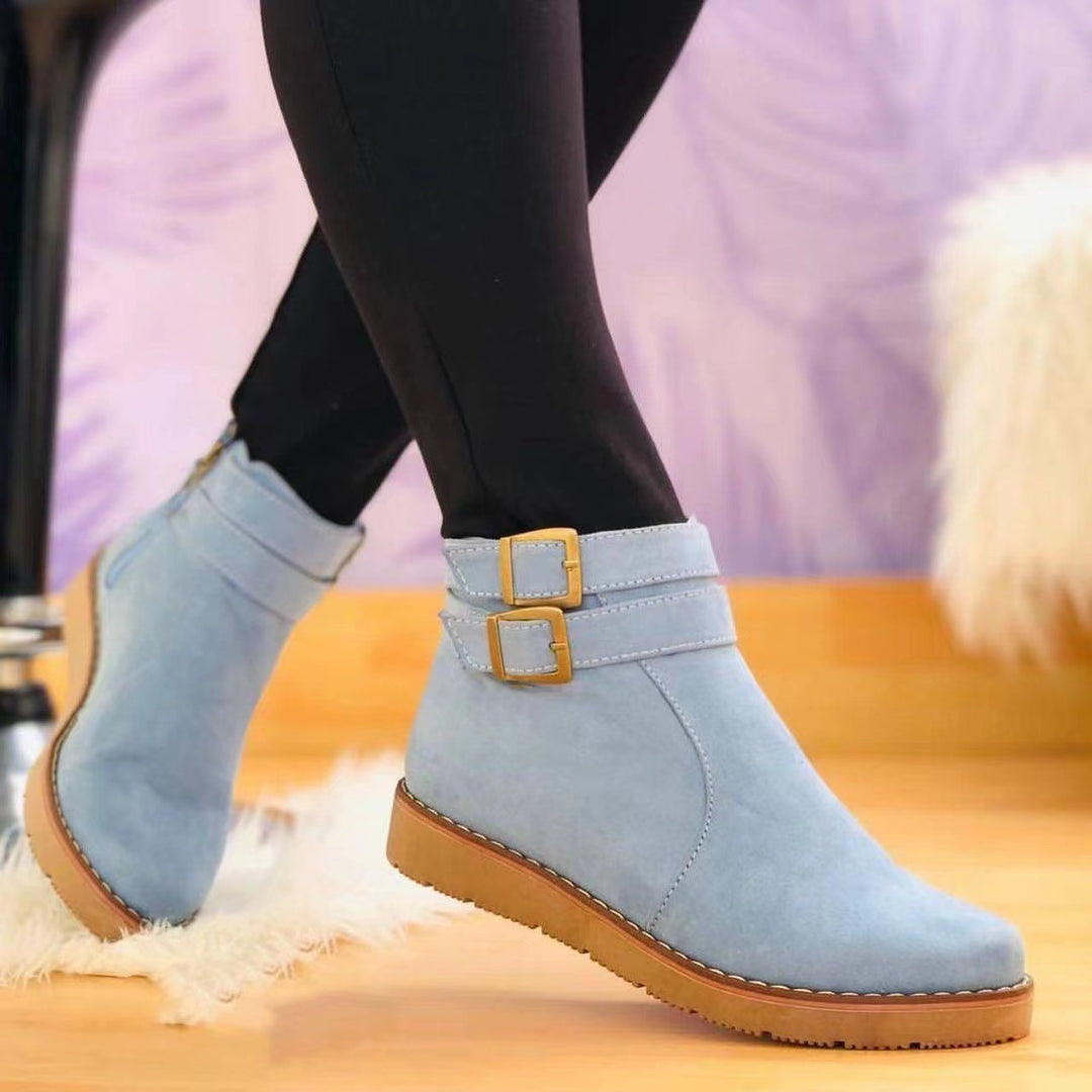Women's faux suede ankle boot with double decorative buckle, side zipper, and slip-resistant profile sole Mune Fashion