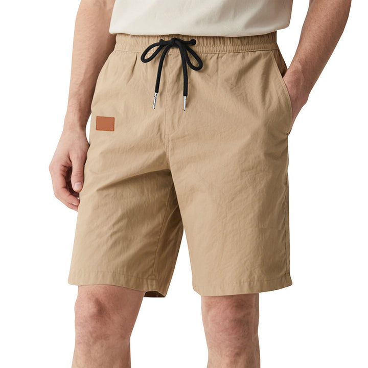 Men's quick-drying swim shorts in Bermuda cut with elastic waistband and drawstring Mune Fashion