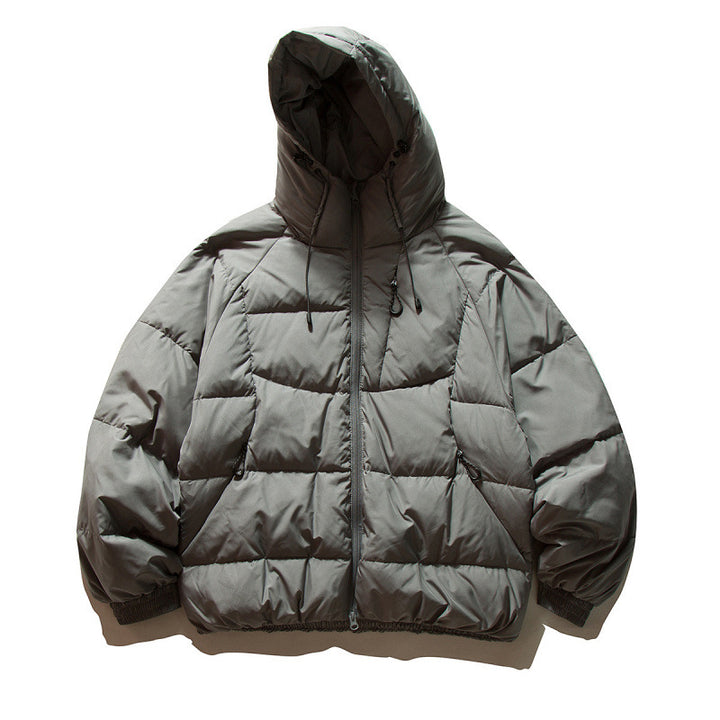 Unisex Oversize quilted jacket in boxy cut with hood and adjustable hem Mune Fashion